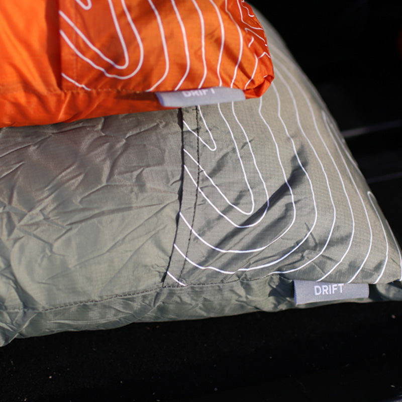 Klymit_DriftPillow_REG_Orange_12DROR01C_LS03_LargeGreen_2000x1333_43382a74-7bd4-4f68-bcae-1ee1f5786625.jpg